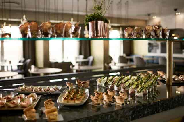 Tivoli theater buffet: Tiered gourmet hors d'oeuvres display for luxury corporate catering events.