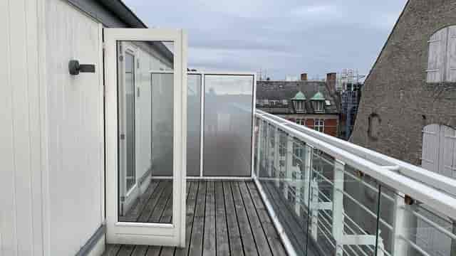 Scandic Front Hotel boardroom balcony, narrow empty outdoor terrace, event venue inspection.