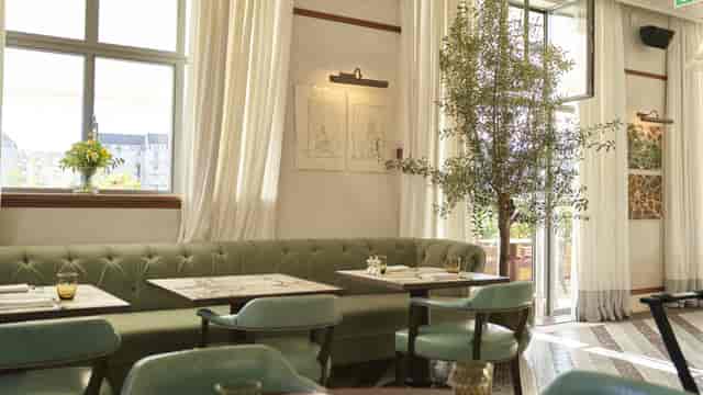 Soho House Copenhagen tufted seating for premium breakout sessions and networking brunch events.