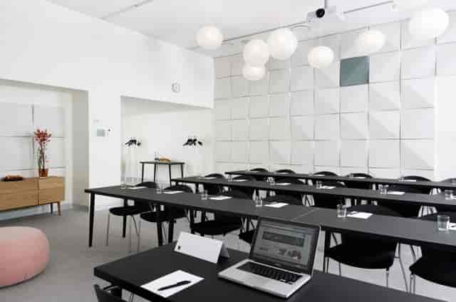 Classroom-style meeting room in AC Hotel Bella Sky, Copenhagen, perfect for corporate training events.