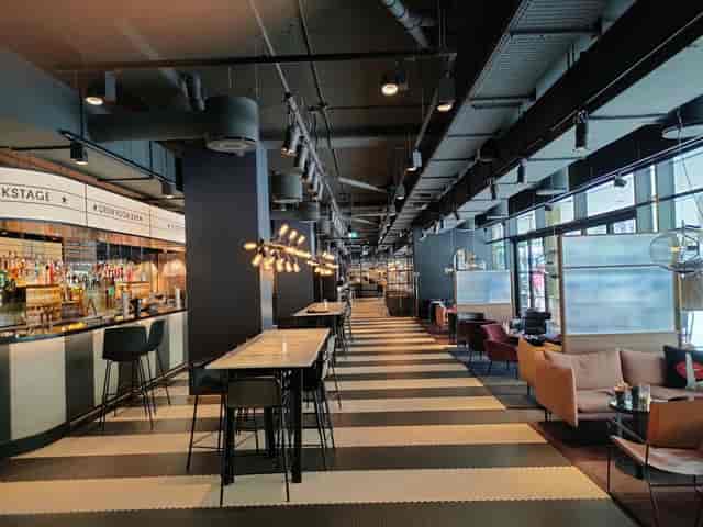Industrial-chic breakout room at Scandic Falkoner for networking and corporate events.