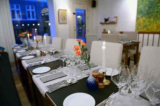 Fuego private dining room with candlelight, perfect for board dinners and networking events.