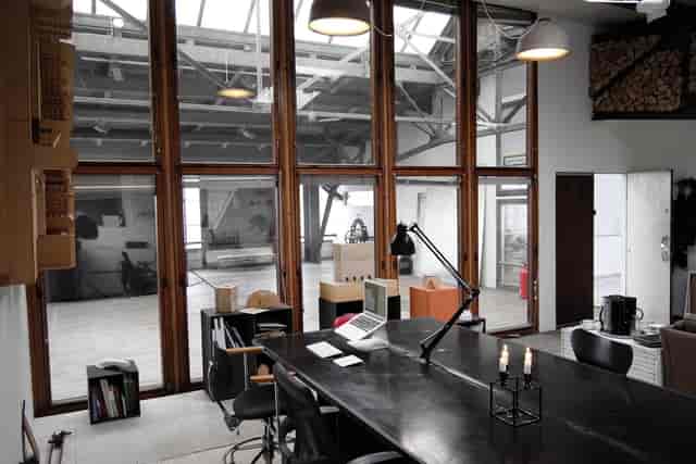 Industrial-chic creative studio and breakout space for corporate meetings and brainstorming events.