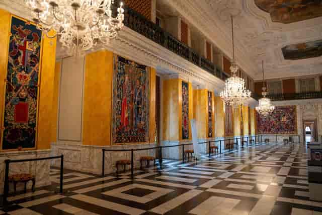 Christiansborg Slot reception room with chandeliers for black-tie galas and VIP events.