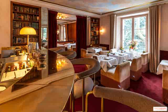 Luxury boutique suite with library aesthetic for corporate dinners and VIP sessions.