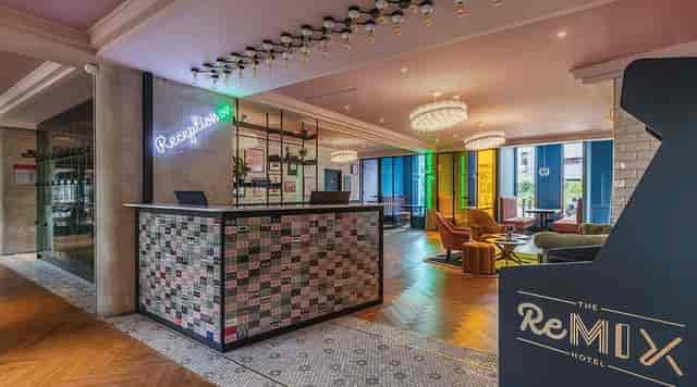 Boutique hotel bar with eclectic decor for networking events and corporate check-ins.