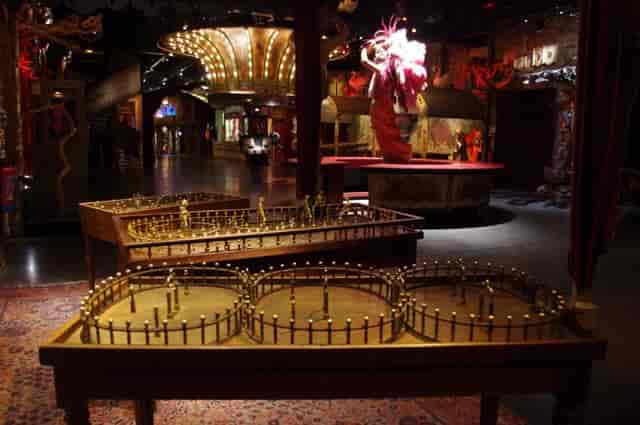 Théâtre du Merveilleux venue with vintage carnival decor for gala events and corporate networking.