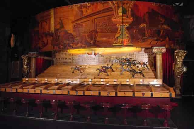 Vintage horse-racing game at Théâtre du Merveilleux for corporate gala or networking event.