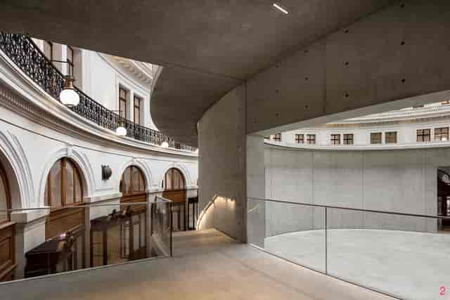 Bourse de Commerce auditorium with brutalist design for cocktail receptions and product launches.