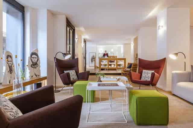 Modern hotel lobby lounge for upscale networking and business breakout meetings.