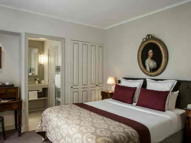 Upscale hotel room with historical accents for VIP accommodations and corporate incentive travel.