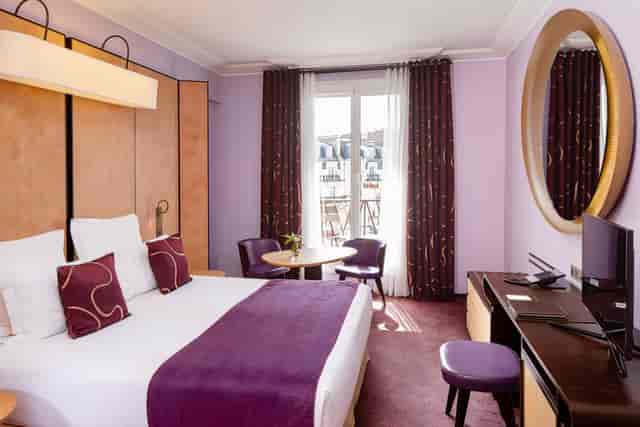 Maison FL hotel suite with workspace, ideal for VIP accommodations and business travel.