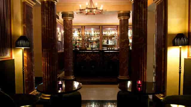 Classic cocktail bar at L'Hotel, ideal for sophisticated VIP receptions and networking events.