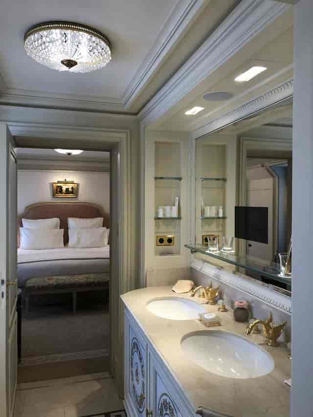 Luxury hotel bedroom at Ritz Paris for executive travel and VIP speaker events.