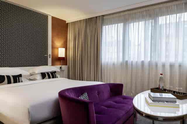 Upscale hotel guestroom for executive meetings and VIP business conferences.