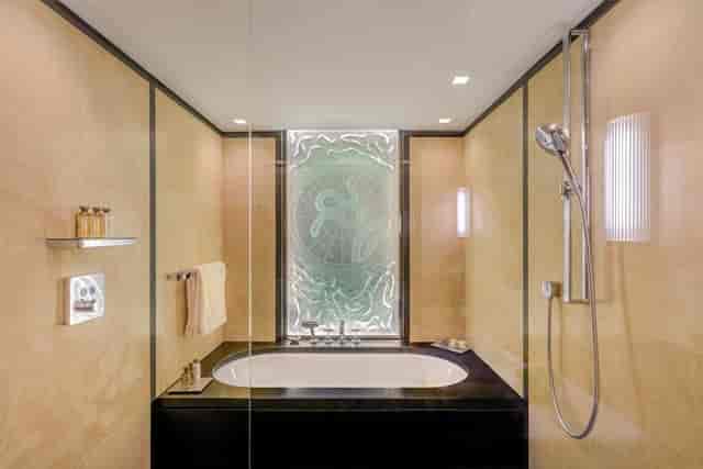 Luxury hotel private dining room soaking tub for VIP corporate events and executive meetings.