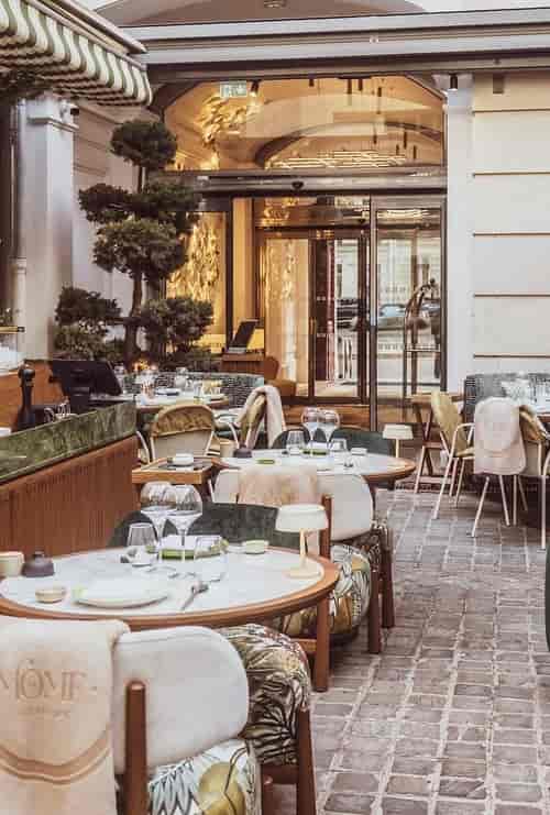 Midô Paris outdoor venue with luxury table settings for upscale networking and VIP dinners.