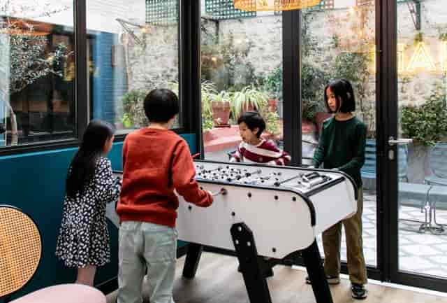 Coworking space at Hôtel Piapia featuring interactive gamification for event networking.