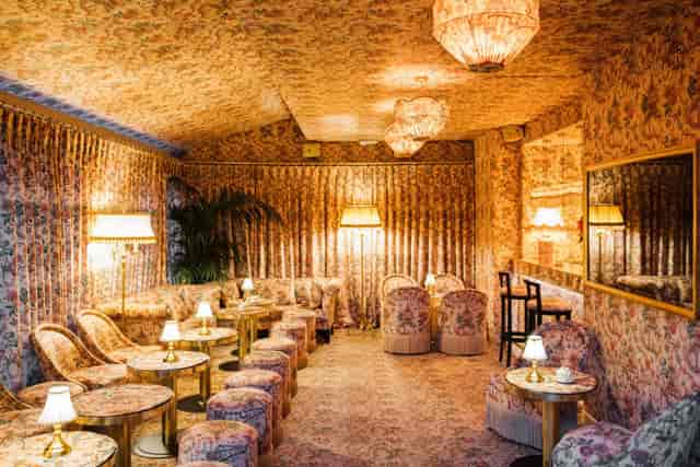 Le Marta lounge with maximalist floral decor for VIP receptions and private events.