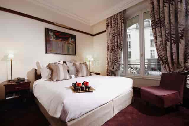 Luxury Hotel Salon Bibliothèque with tea service for VIP corporate events and meetings.