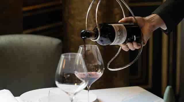 Elegant tableside service at Le Gabriel fine dining, perfect for luxury events and gala dinners.