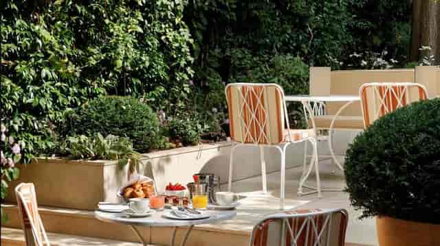 Patio area at Le Belgrand Hotel Paris, intimate space for VIP breakfast and networking events.