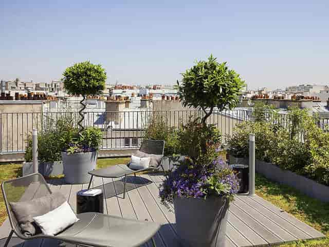 Rooftop breakout space at Hôtel Paris Bastille with city views for networking and VIP meetings.