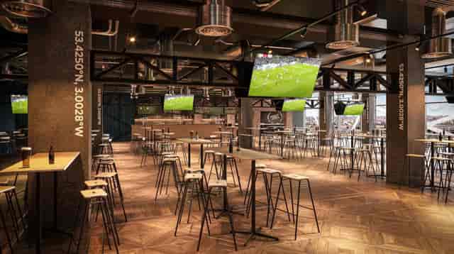 Industrial-chic Yard venue at Hill Dickinson Stadium for corporate mixers and pre-game events.