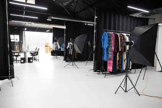 Modular industrial photography studio for professional product shoots and fashion content creation.