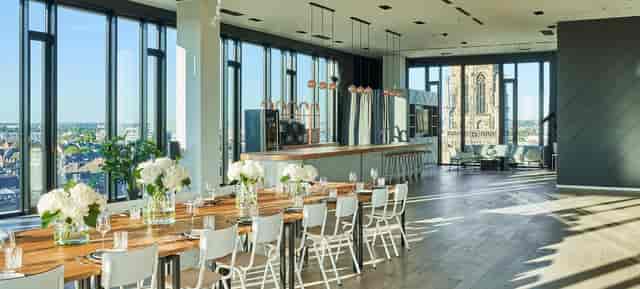 Amsterdam Lounge rooftop venue with floor-to-ceiling views for boardroom dinners and receptions.