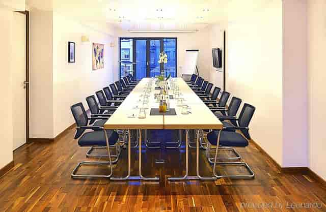 Business Wieland Hotel boardroom with rectangular conference table for strategy sessions.