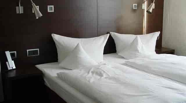 Business Wieland Hotel twin-bed room for corporate events and business conferences.
