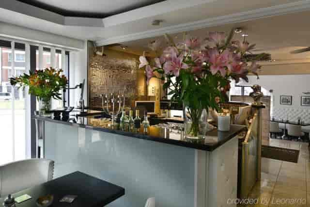 Modern hotel lounge with bar for boutique networking events and corporate conferences.