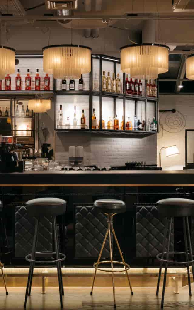 Ruby Coco Hotel moody bar for intimate post-conference reception and corporate networking events.
