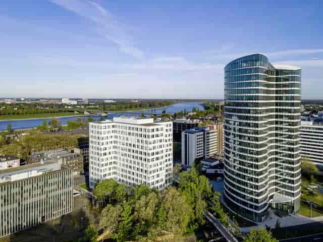 Modern Düsseldorf conference center with sleek architecture for corporate events and business meetings.