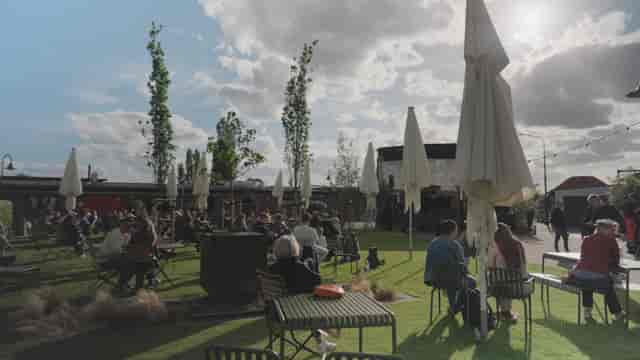 Outdoor networking reception area at Areal Böhler for corporate event or business breakout space.