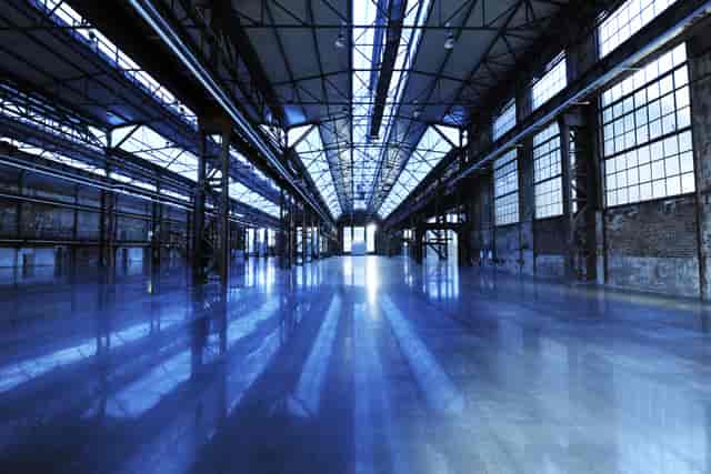 Industrial Glühofenhalle at Areal Böhler: raw experiential event space with architectural character.