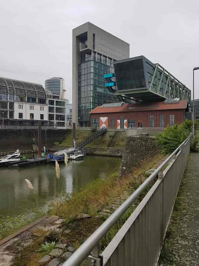 Industrial-chic event venue, Courtyard Duesseldorf Hafen with historic brick, corporate conference.