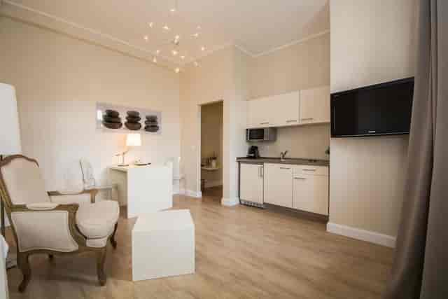 Classic Suite with kitchenette for business travel or VIP event accommodation.