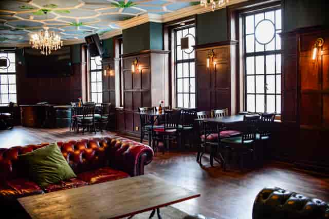 Wood-paneled function room for networking mixers and corporate events at The Ram.