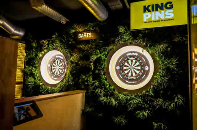 Vibrant darts area at King Pins, ideal for corporate events and casual gatherings.