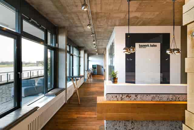 Modern industrial reception area at Invora Haven for corporate events and networking.
