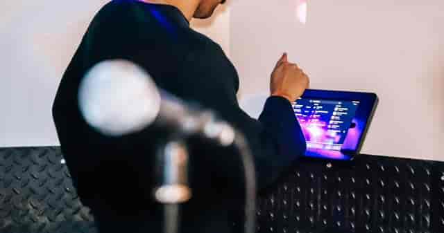 Karaoke room in King Pins Bristol with touchscreen for engaging events and presentations.