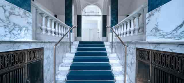 Luxury gala entrance at Villa Boisserée with red carpet runner for VIP event arrivals.