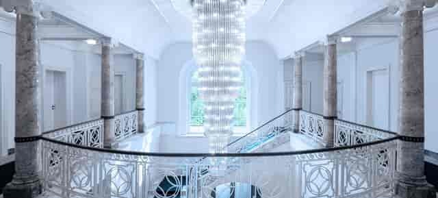 Elegant gala entrance stage at Villa Boisserée, premium event registration area.