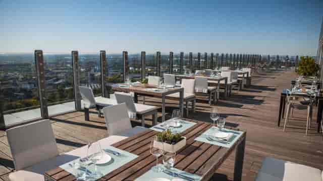 Savoy Hotel Köln rooftop terrace: panoramic venue for upscale networking and VIP dining.