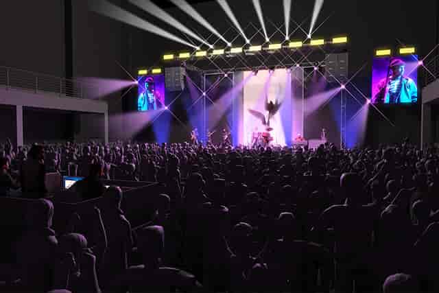 Concert stage at MMC Studios Cologne with professional rigging and AV screens for live events.