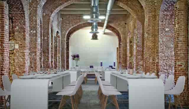 Industrial Event Loft with exposed brick for corporate dinners and product launches.