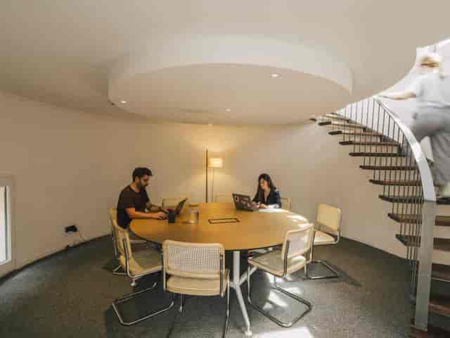 Circular breakout office space for workshops and collaborative meetings at Cloudworks.