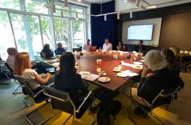 Boardroom at The Building Centre with round table for productive meetings and presentations.